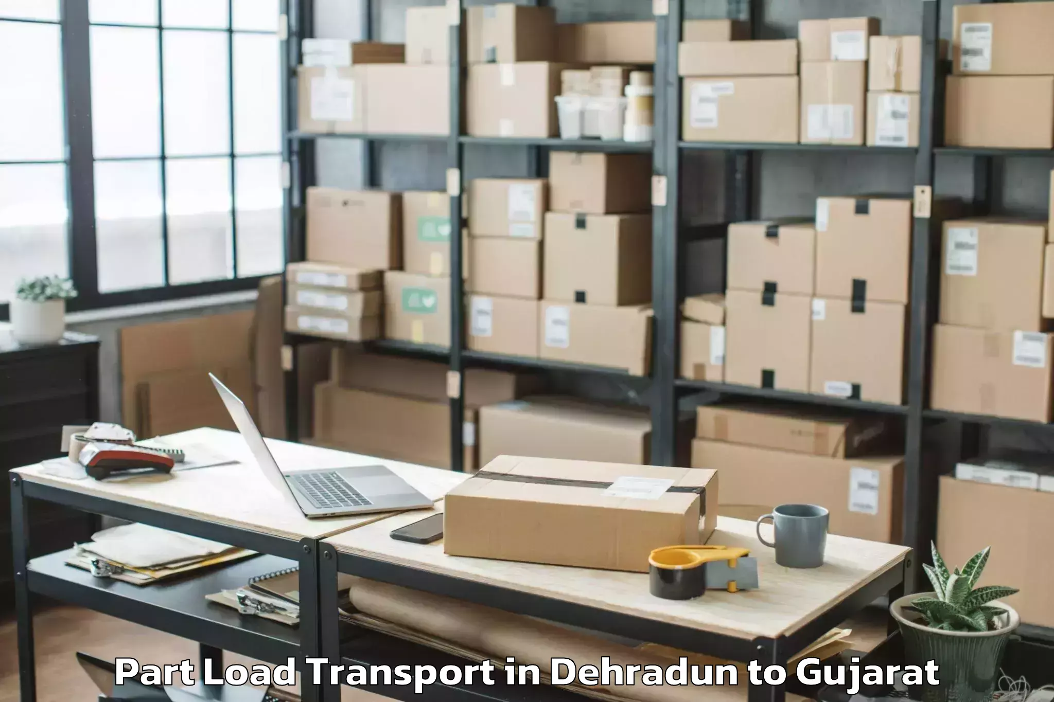 Quality Dehradun to Rk University Rajkot Part Load Transport